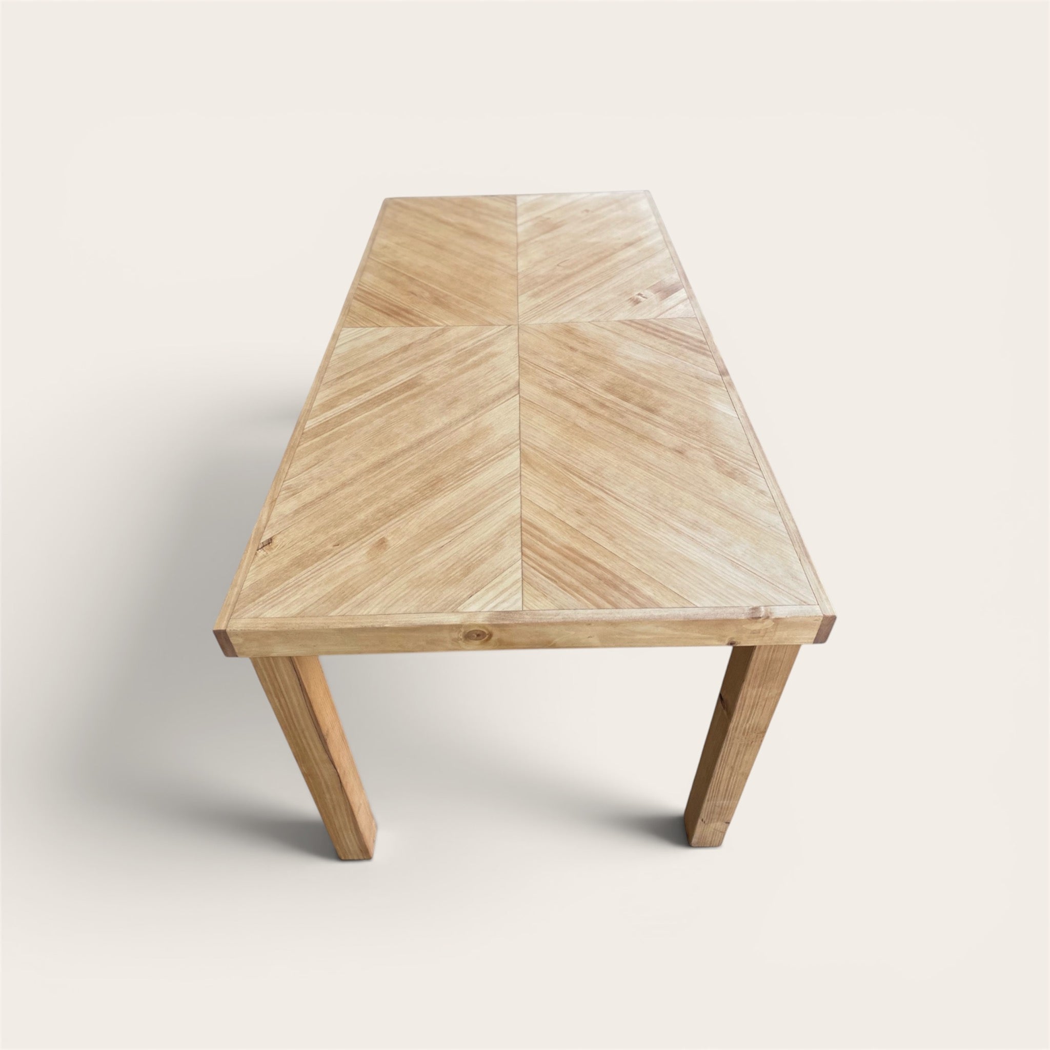 HAKKODA Solid wood herringbone dining table.